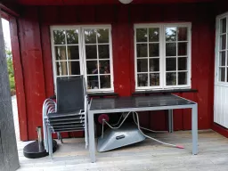 Hagemøbler med sitteplasser på terrassen
