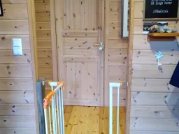 Safety gate between living area and staircase – ideal for families with children