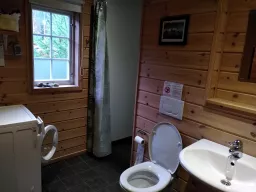 Bathroom overview with sink and toilet